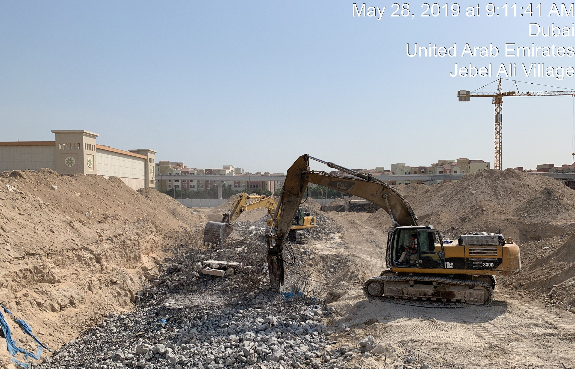 CAT 330D excavator at foundation debris removal