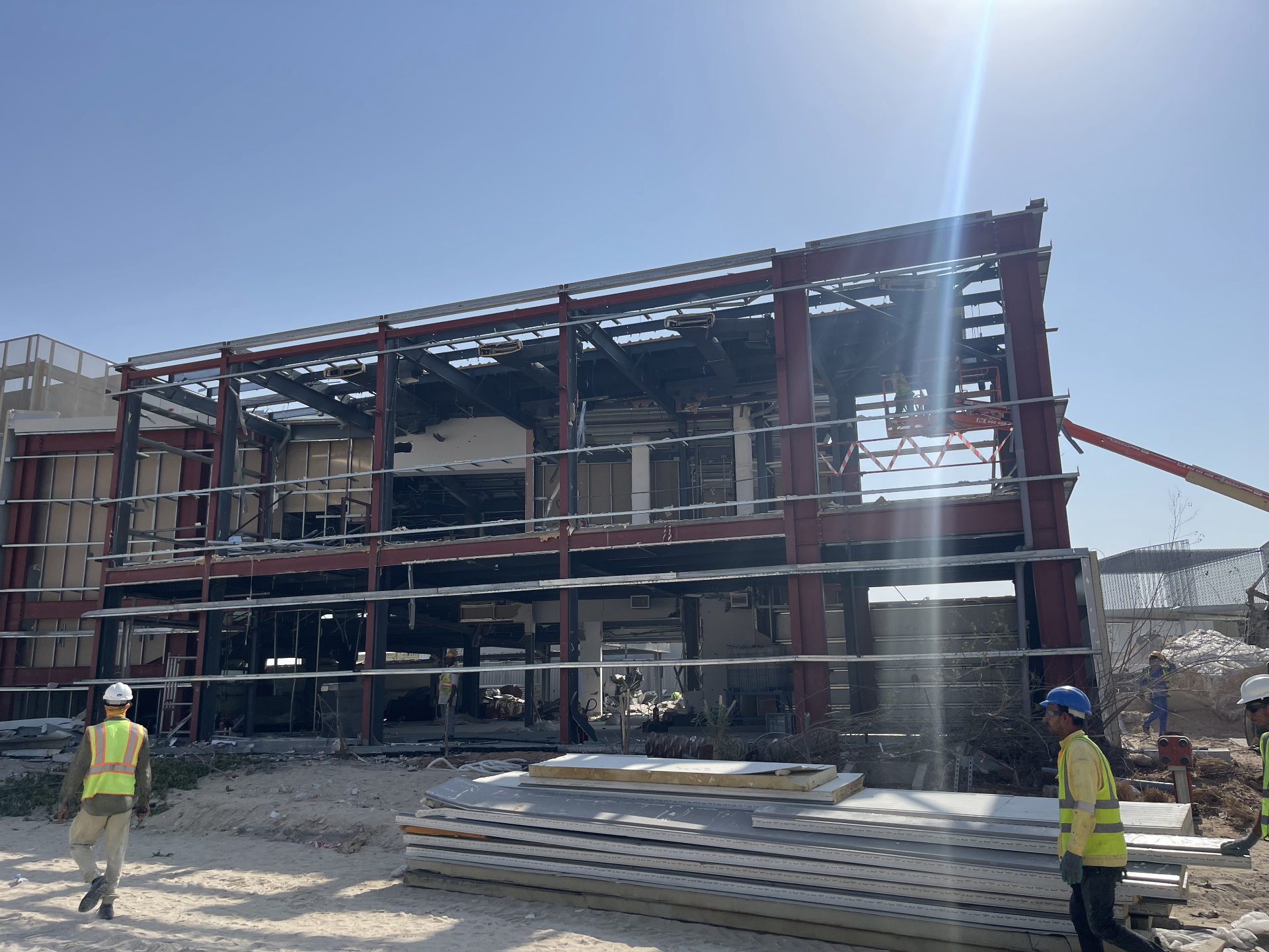 Workers at Czech Pavilion demolition site