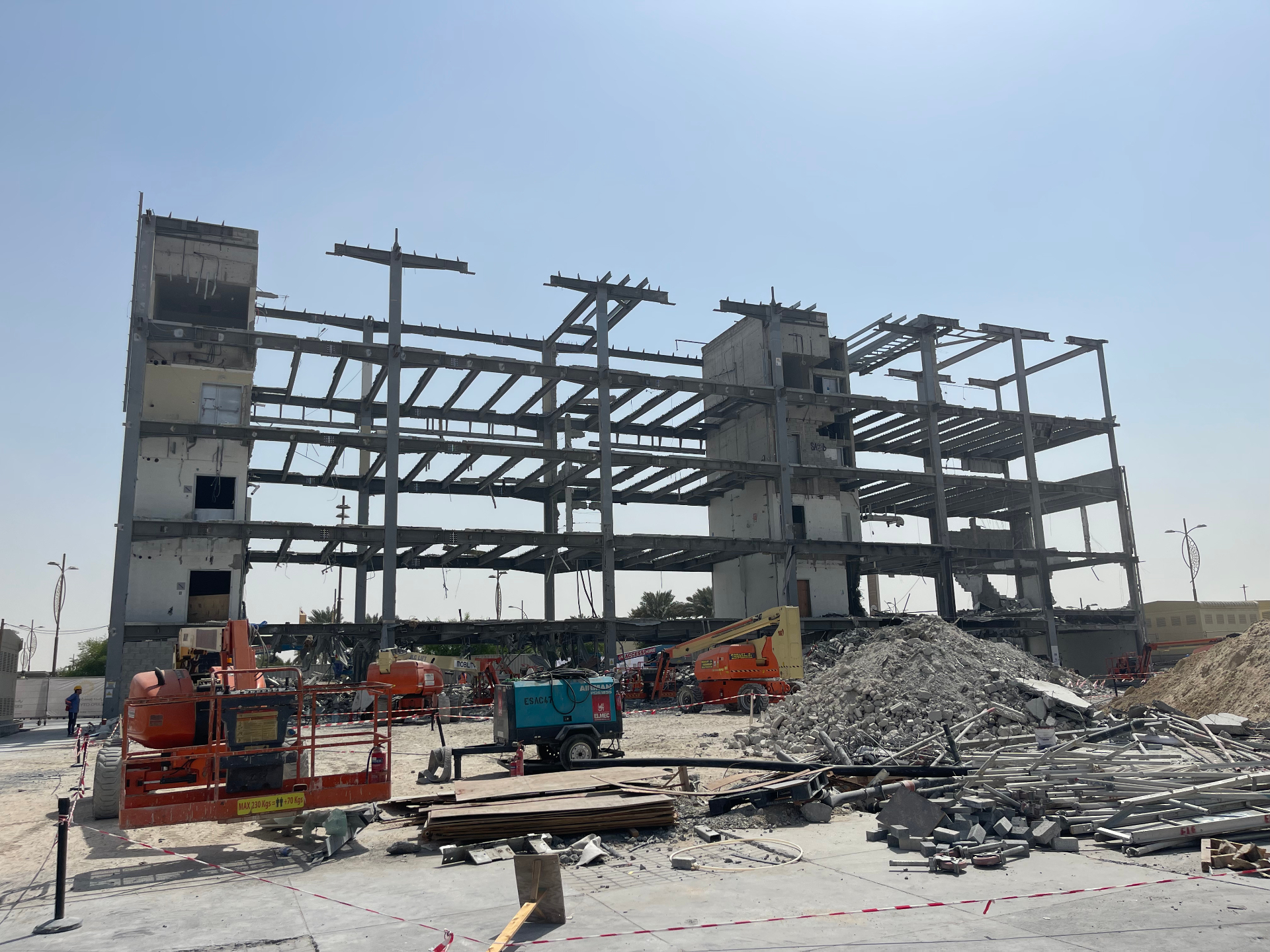 Steel frame exposed during France Pavilion demolition