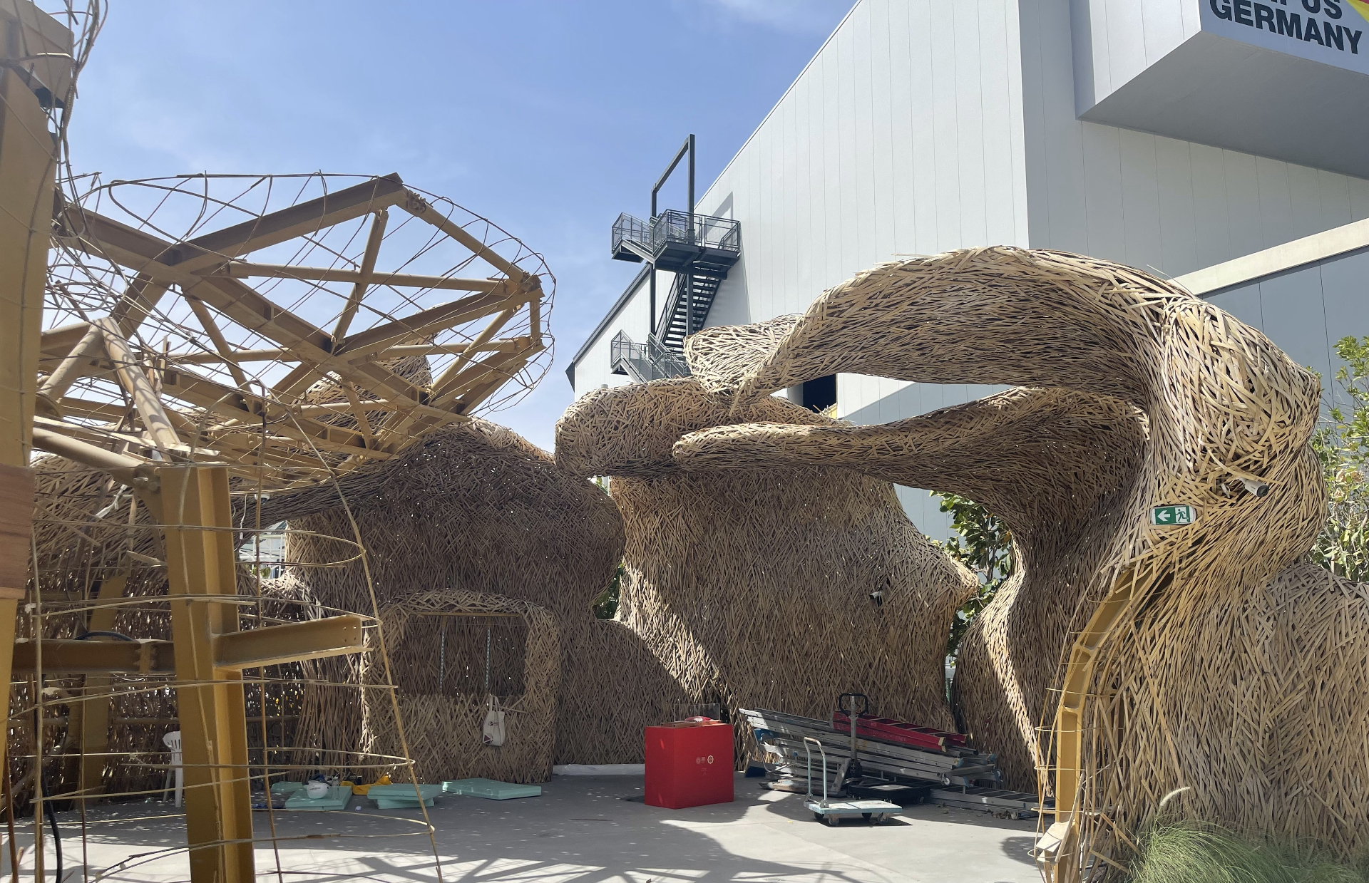 ICD Pavilion bamboo structure with exposed steel framework during demolition