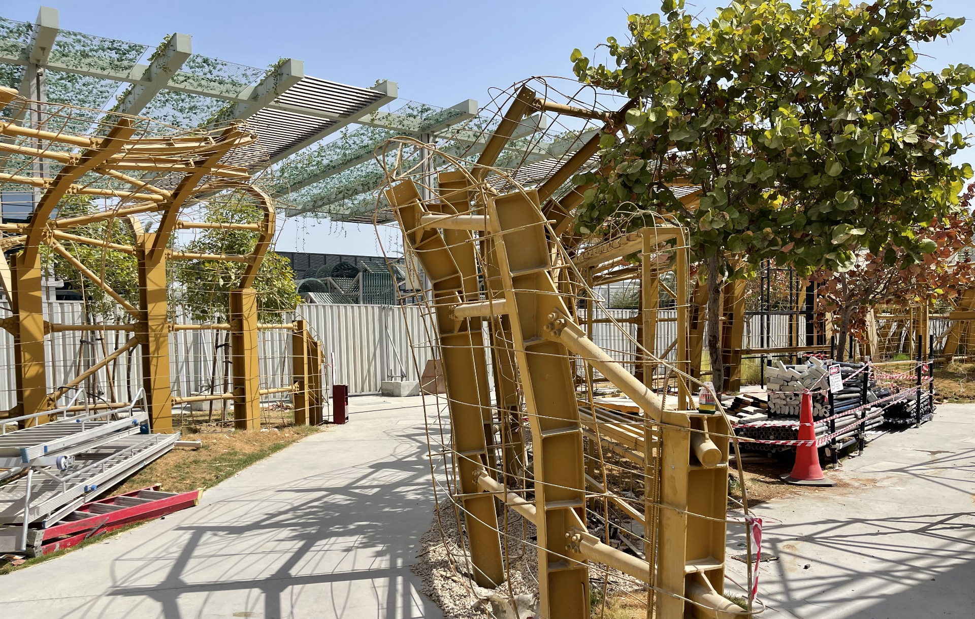 ICD Pavilion curved steel arches with pergola during demolition