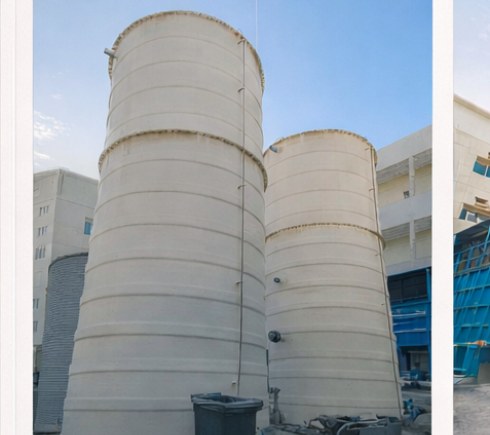 Large GRP storage tanks at sewerage treatment plant in Jebel Ali camp prior to demolition by USF Demolition Works