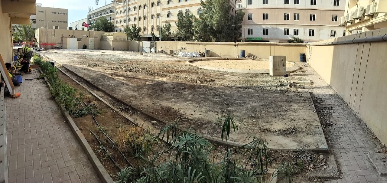 Final handover view of demolished sewerage treatment plant area at G+2 G+3 camp Jebel Ali Dubai June 2026