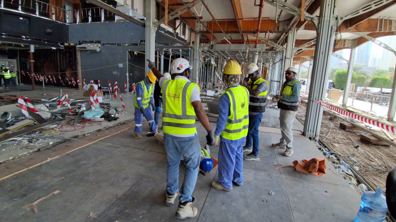 Safety coordinators reviewing emergency response at Zero Gravity construction site