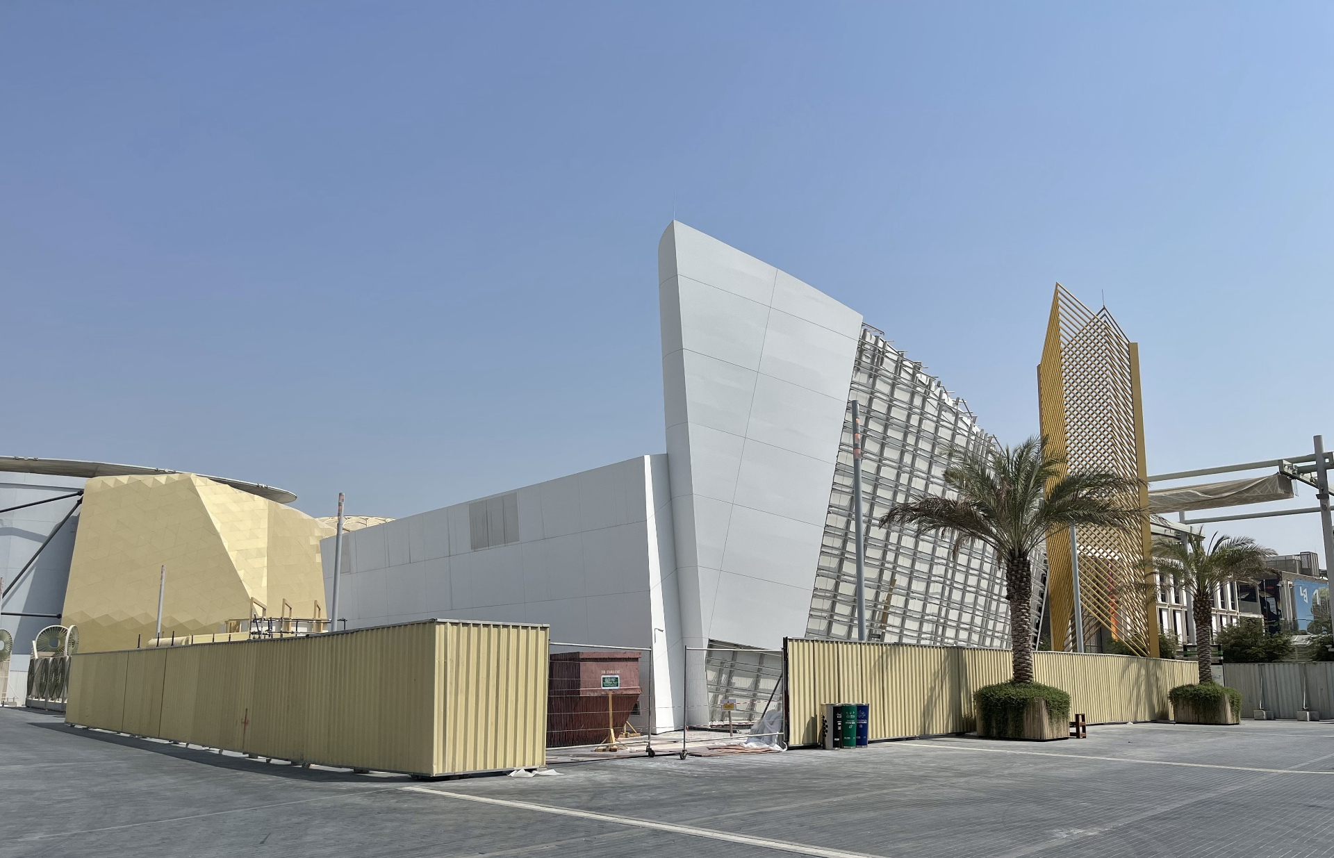 Qatar Pavilion site view with steel grid exposed during demolition