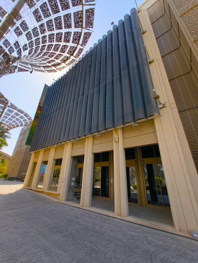 Building facade with tubular metal cladding at Expo City Dubai