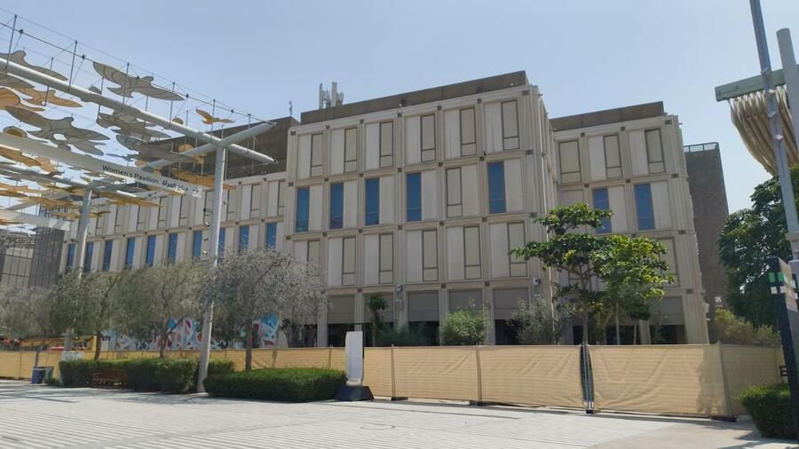 Women's Pavilion building with exposed structure after facade cladding removal at Expo City Dubai