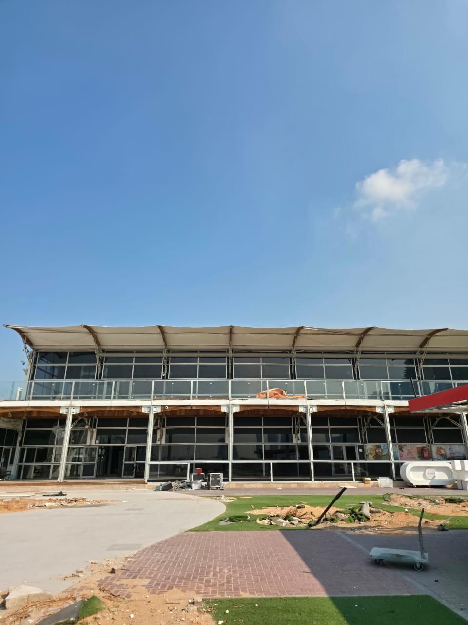 Zero Gravity main venue with tensile roof and glass facade