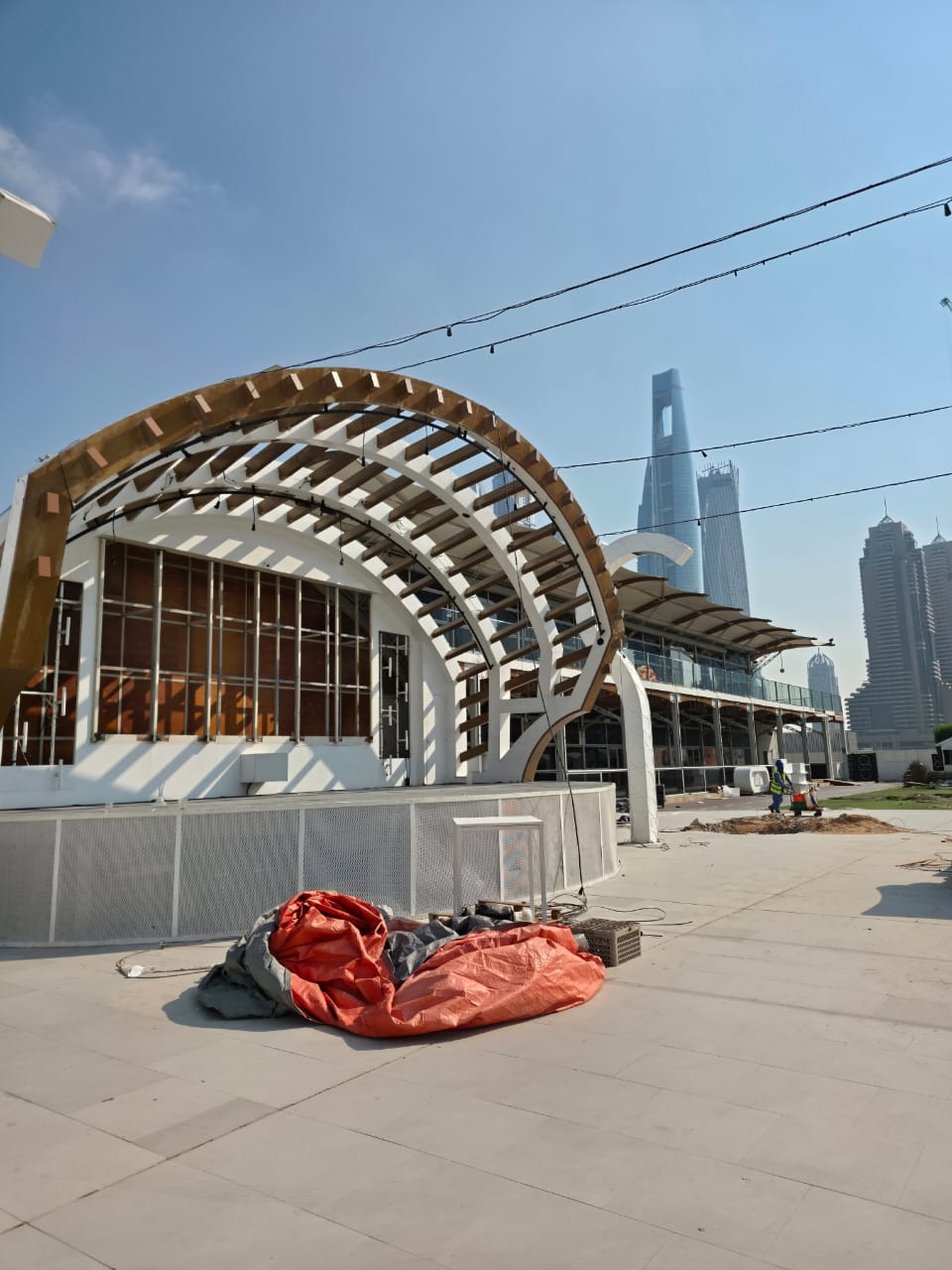 Zero Gravity curved architectural feature with wooden pergola